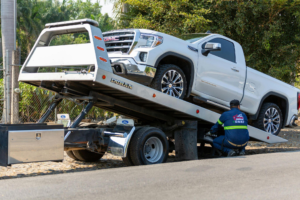 This photo shows a truck getting towed.